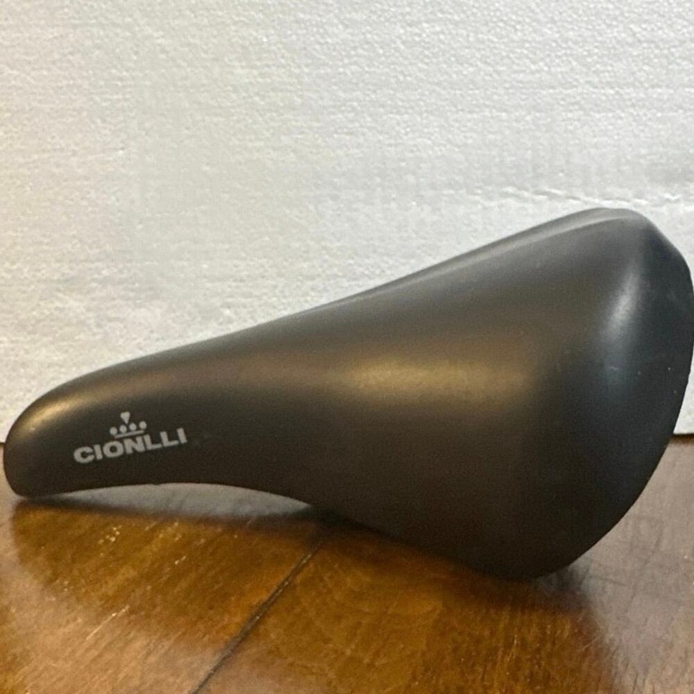 This is a black Cionlli bicycle saddle #748 Ultra 2 padded Adult seat. Sea pics